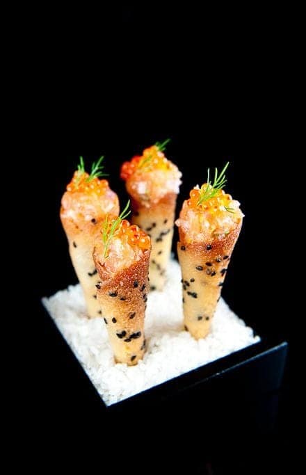 10 | SALMON TARTARE CORNETS WITH SWEET RED ONION CREME FRAICHE